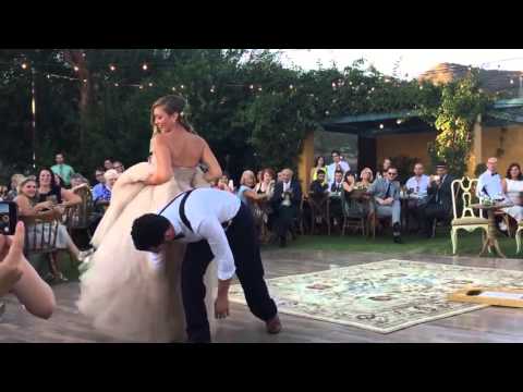 Bride puts a spell on her magician groom during first dance